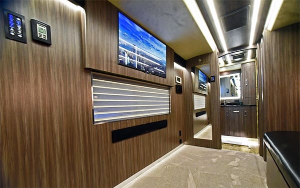 interior controls and tv blinds provided by hemphill custom built buses